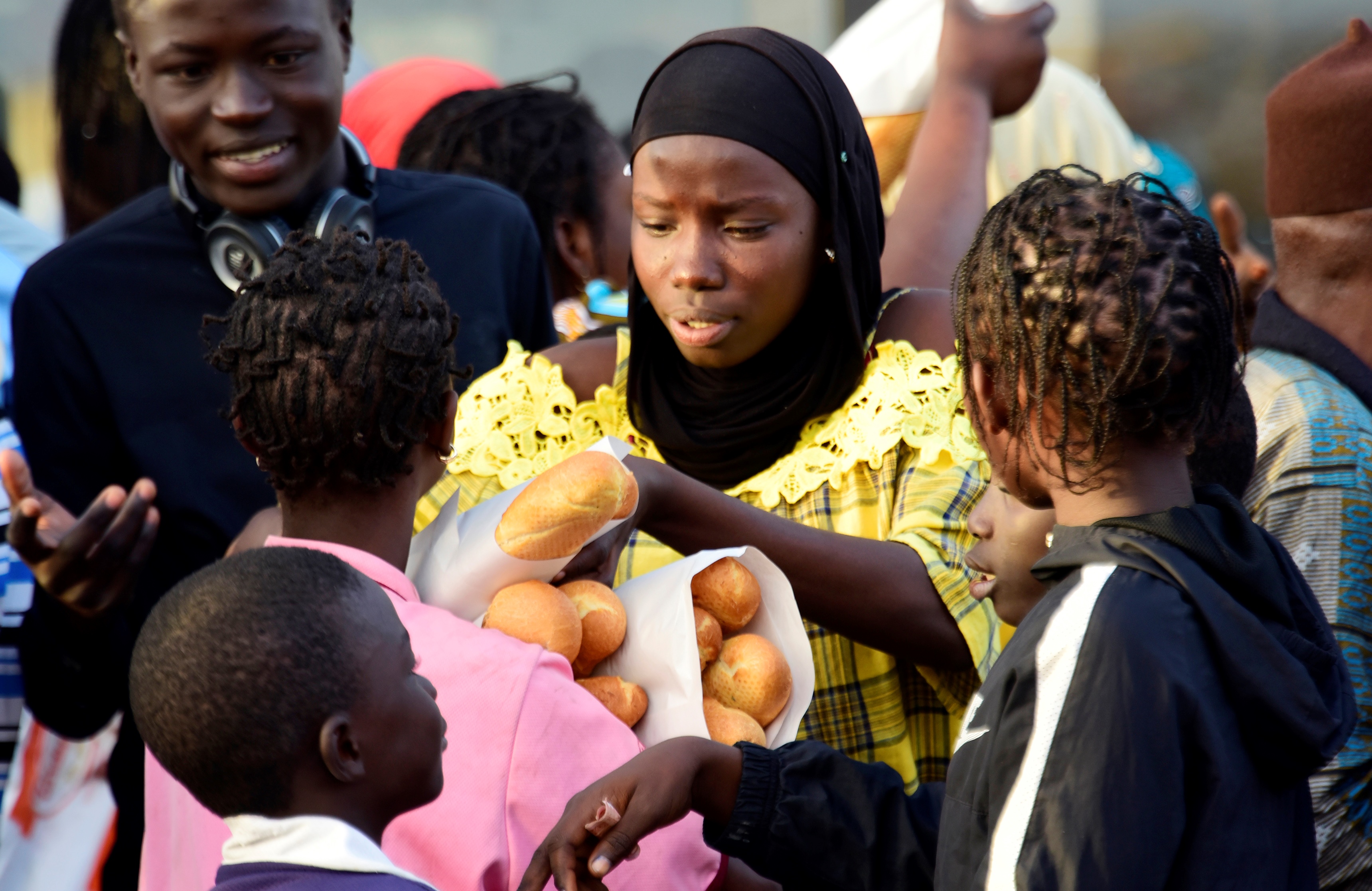 A woman with baguettes in Senegal