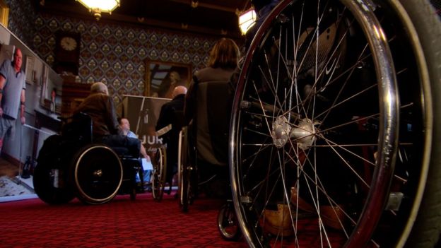 Troubles victims with wheelchairs at meeting in July 2019
