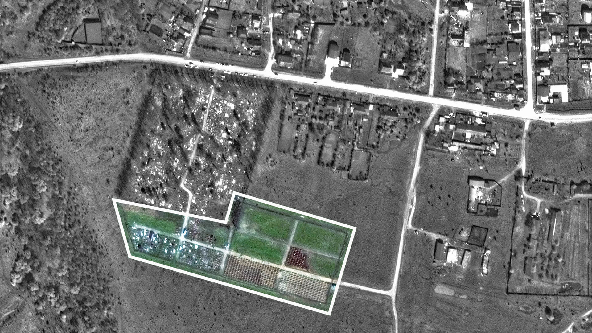 Satellite image of a cemetery in Bakinskaya from April 2023, showing plots filled in with several more rows of graves