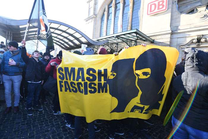 Protesters demonstrate outside the Koblenz event