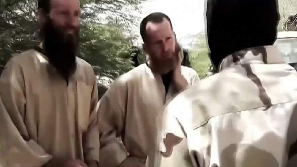 Stephen (centre) in a hostage video Stephen (centre) in a hostage video
