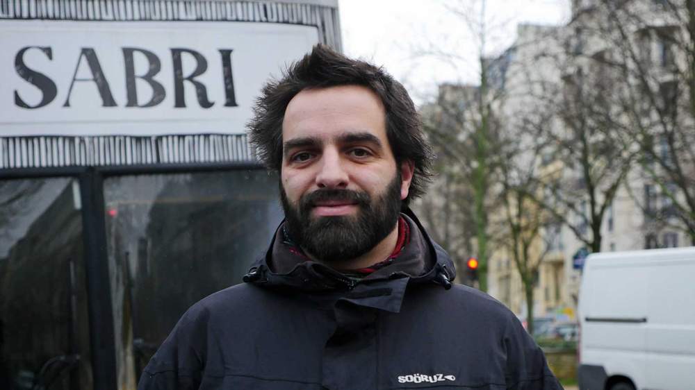 Clement Etienne runs a cafe for homeless people in a double-decker bus