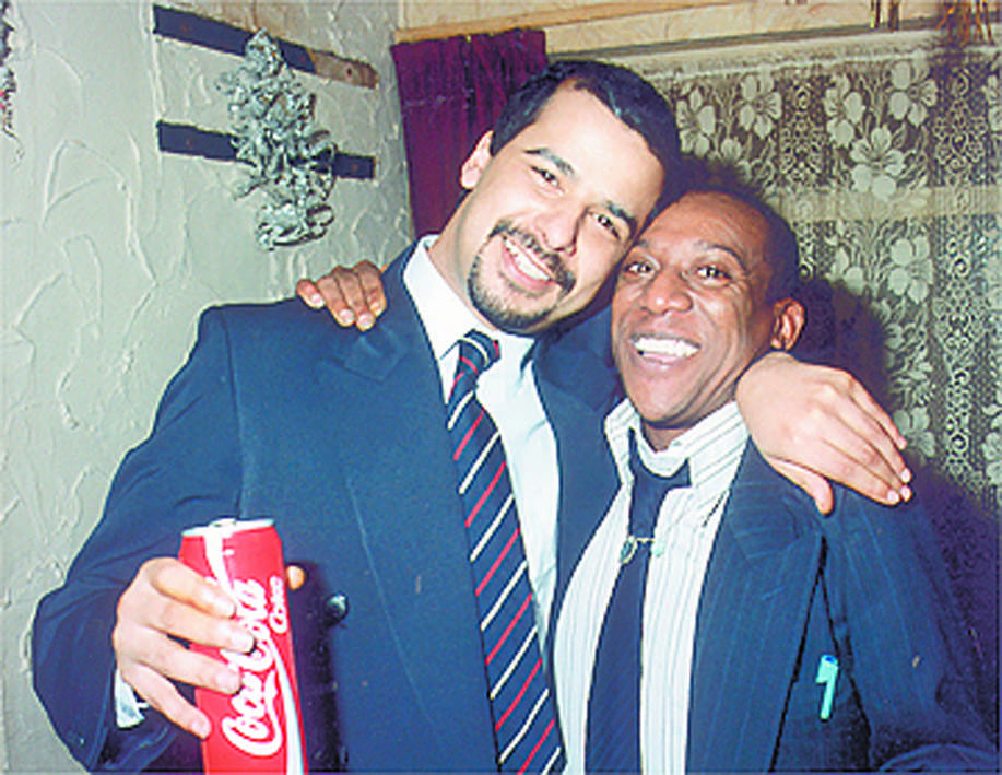 First night of freedom for four years and one day: Yusef Abdullahi and Tony Paris at a welcome home party