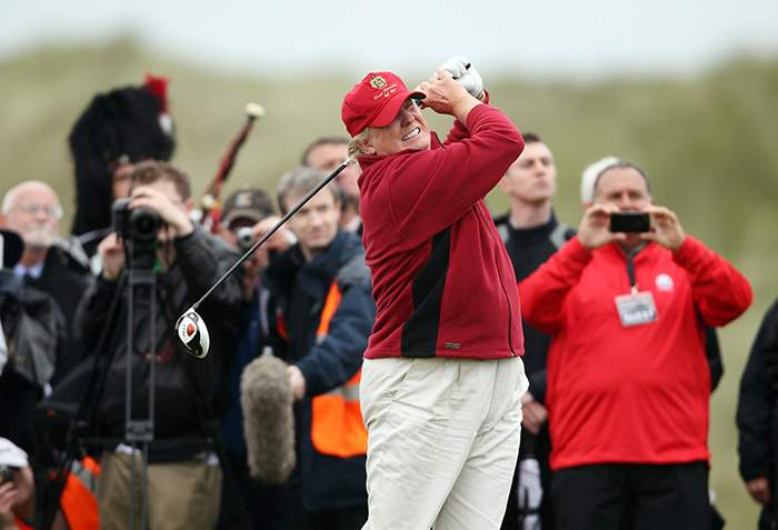 The first ball is hit at Trump International Golf Links Scotland