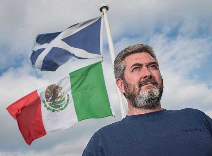 The Mexican flag flies from David Milne&#39;s home