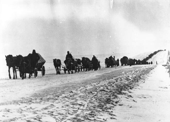 Germans soldiers retreating to the west by horse and cart on a snowy Soviet road in 1944