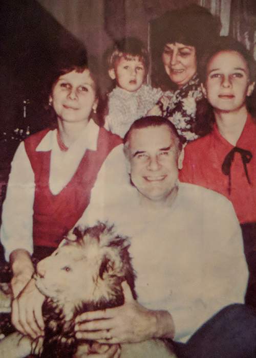 Yashin with his family (along with the stuffed lion toy)