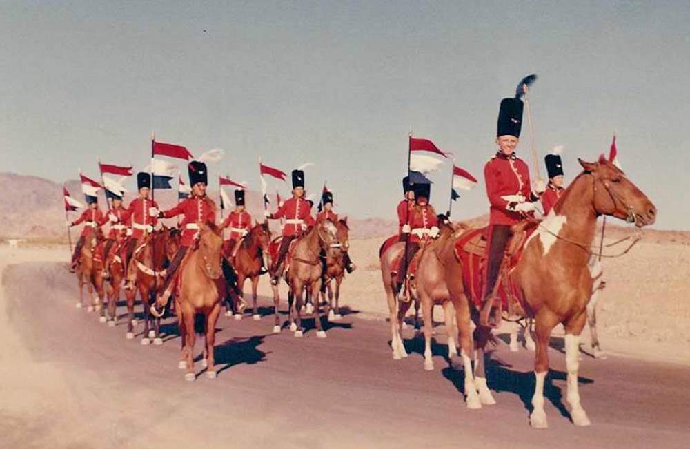 Riders on horseback made a strange sight against the desert backdrop
