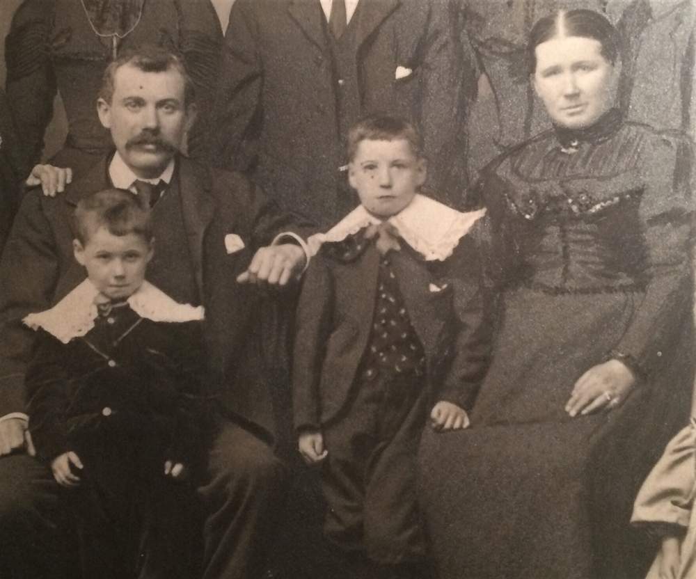 Jimmy (left) and Angus with parents Anthony and Elizabeth