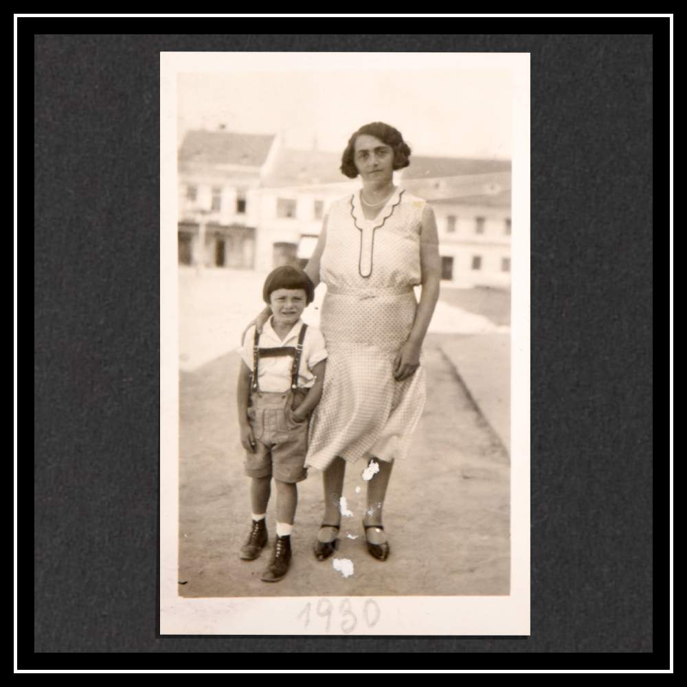 Hedwig and Kurt, in ‘Lederhosen’, outside the family shop in Gmünd, 1930