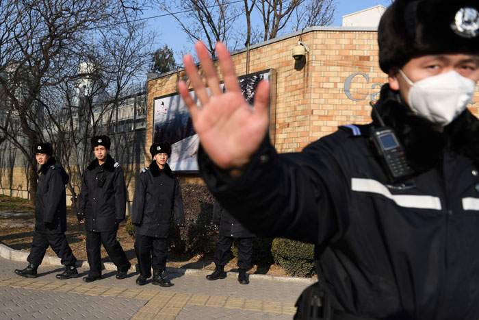 December 2018: Chinese police patrol outside Canada&#39;s embassy in Beijing