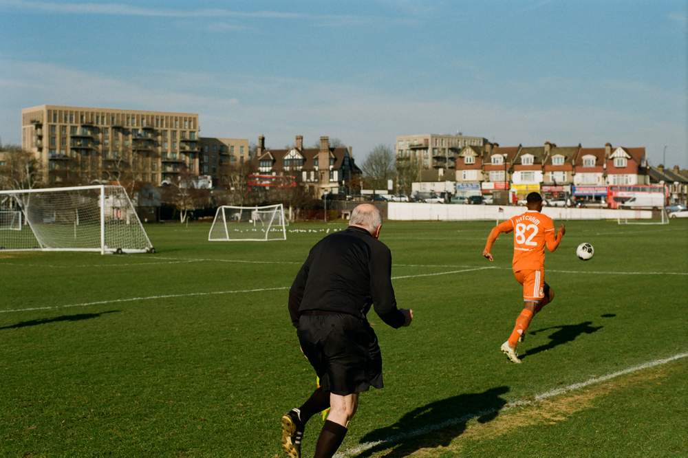 One linesman struggles to keep up with the action