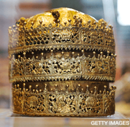 A Crown, made in Ethiopia around 1740, made of gold and gilded copper with glass beads, pigment and fabric is pictured at an exhibition, 'Maqdala 1868, A reflection on the 1868 siege and battle at Maqdala', at the Victoria and Albert museum in central London, on April 5, 2018