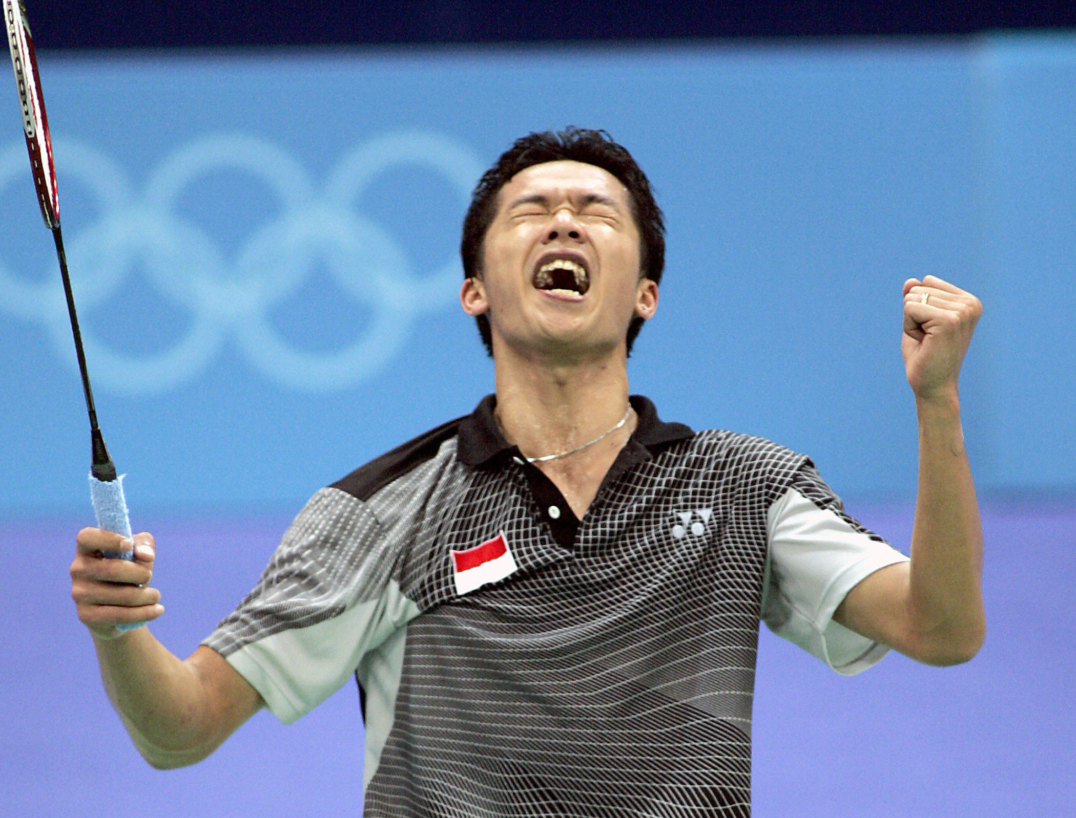 Taufik sesaat setelah mencetak skor penentu di gim kedua pertandingan final Olimpiade pada 2004 silam.