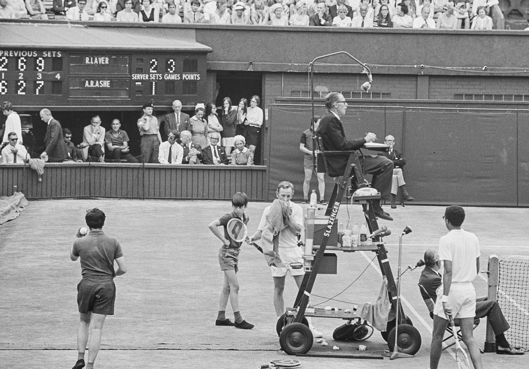 Rod Laver, dressed all in white, won Wimbledon in 1968